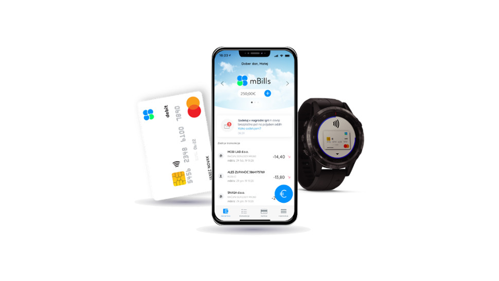 Bela mBills Mastercard kartica, pametni telefon z odprto mBills aplikacijo ter pametna ura z možnostjo brezstičnega plačevanja.