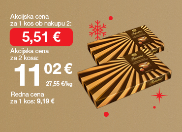 Bonboniera  Bajadera 200 g na svetlo rjavo-zlatem ozadju. Ob unovčenju 8 zlatih točk akcijska cena za 1 kos ob nakupu 2 je 5,51 €, skupna cena za 2 kosa je 11,02 €. Redna cena za 1 kos: 9,19 €. V ozadju so rdeče snežinke.