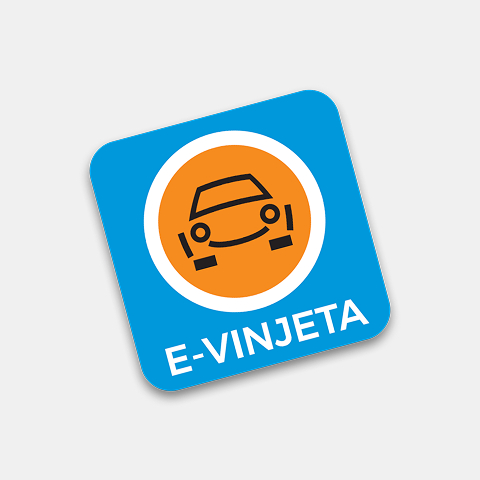 Na sliki je modra e-vinjeta z oranžnim krogom, ikono avtomobila in napisom »E-vinjeta«.